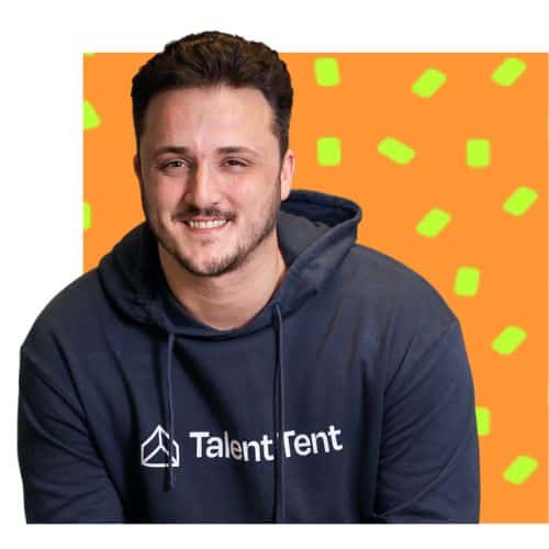 Image of a white male in front of an orange decorative square